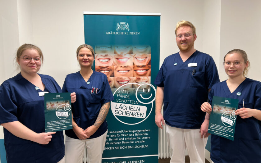 Kampagne „Statt Hände schütteln – Lächeln schenken“